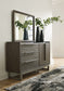 Arkenton California King Panel Bed with Mirrored Dresser and Chest