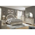 Realyn King Upholstered Storage Bed